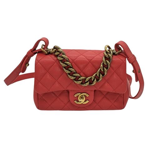 CHANEL Shiny Sheepskin Quilted Mini Trapezio Flap .